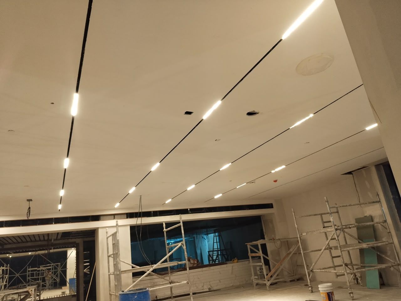 Linear ceiling lights during installation